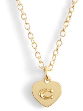Coach signature C gold necklace. NWT.